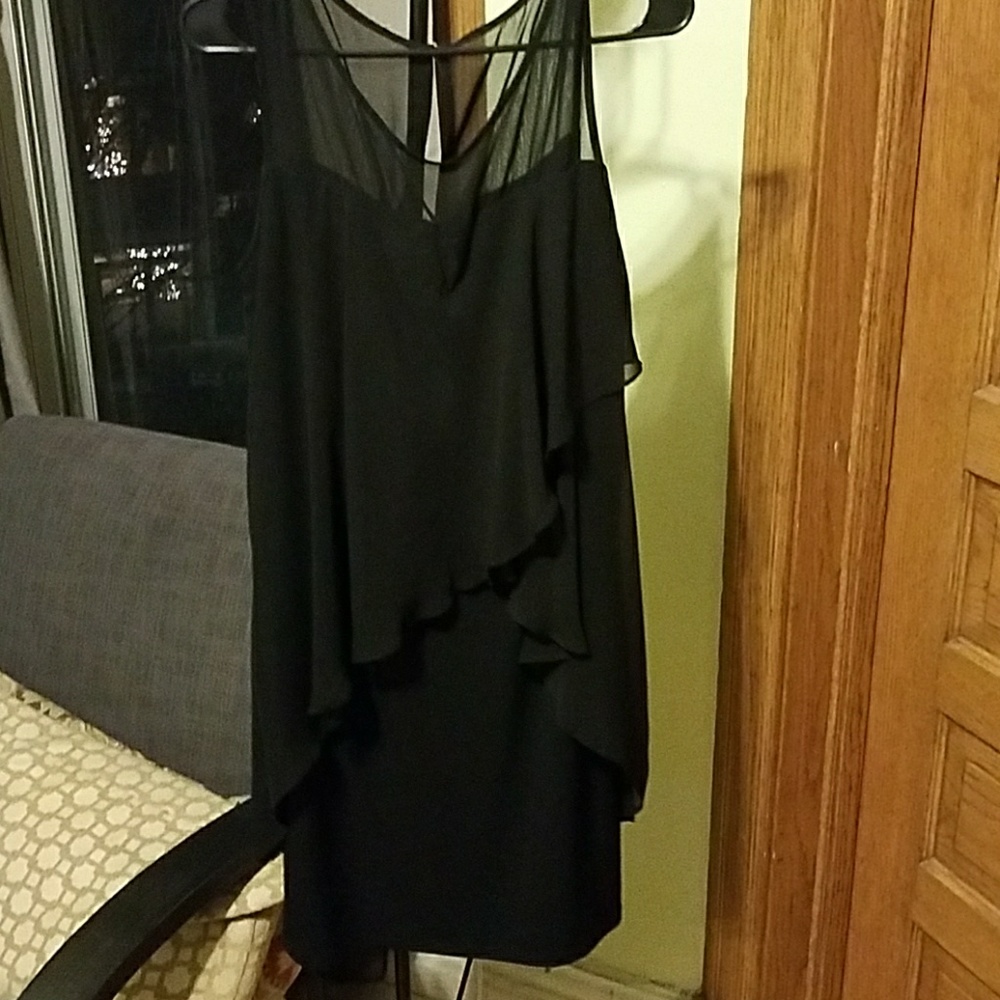 Black dress with asymmetrical overlay